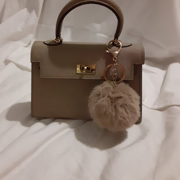 NWOT Mini Structured Vegan Leather Handbag Matching Pom Pom Charm Light Beige - Picture 1 of 6